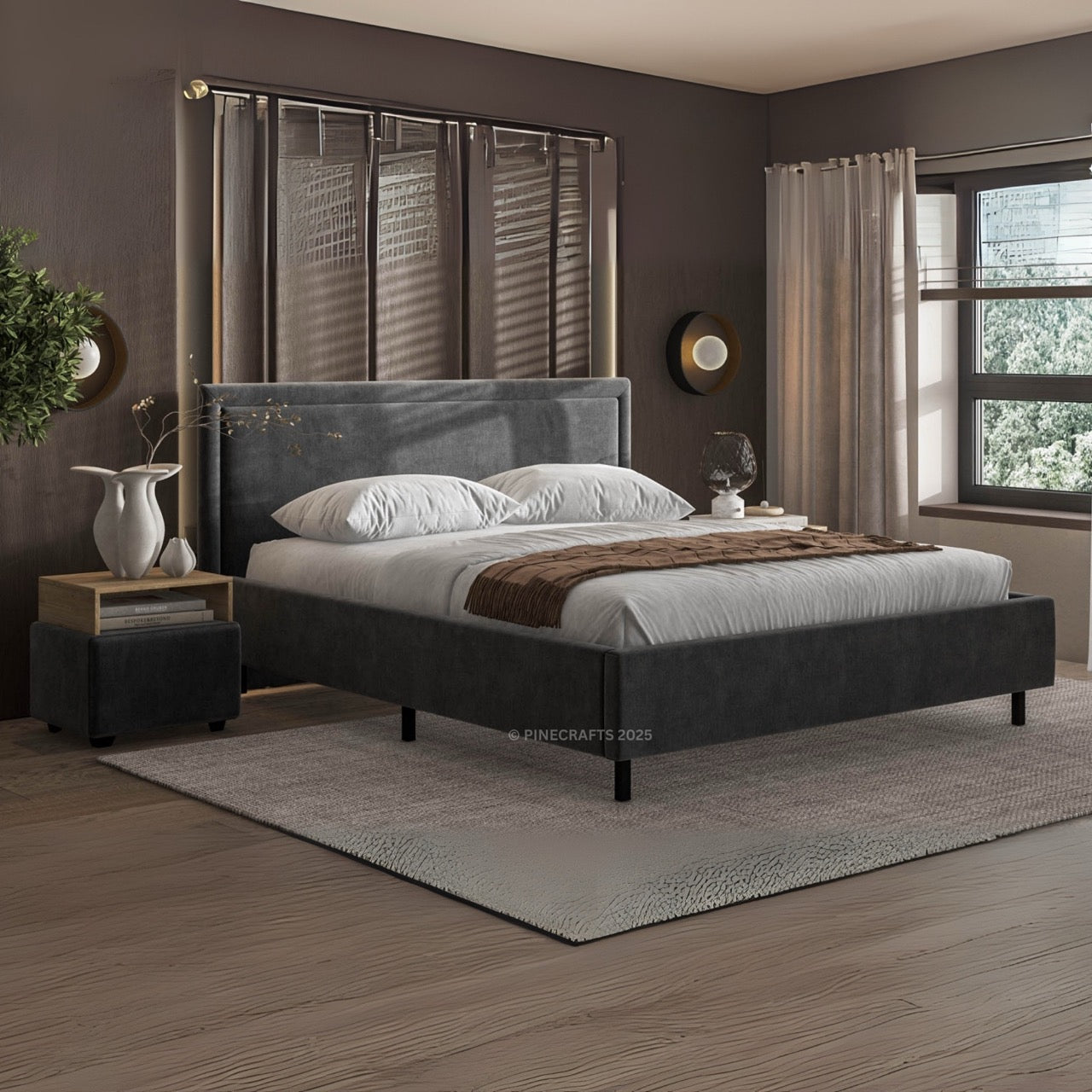 Modern bedroom with a gray upholstered bed, nightstands, and decor.